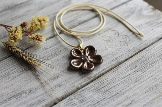 Ciondolo ceramica Fiore bronzo