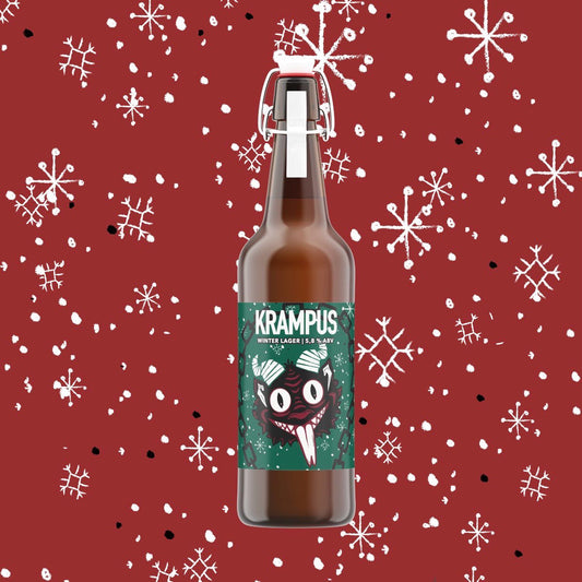 La bottiglia con tappo meccanico sul fondo rosso a fiocchi di neve, l'etichetta verde con il Krampus