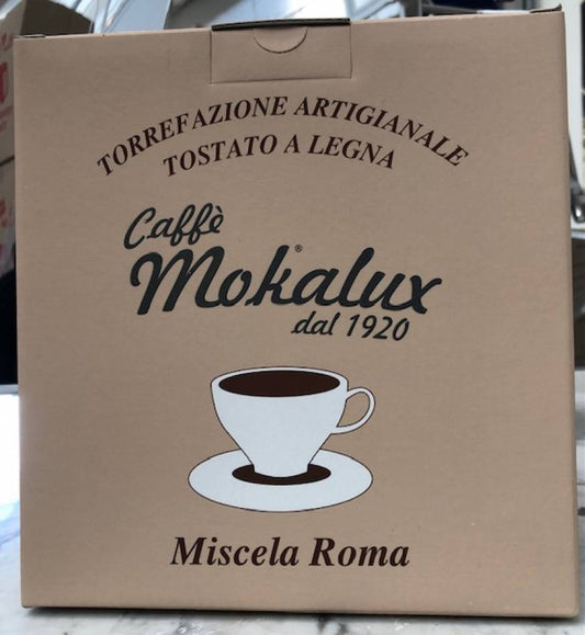 Il cartone con il marchio Caffe Mokalux dal 1920