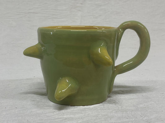 Tazza verde e gialla con cactus dipinti