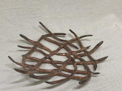 Low red clay centrepiece with modelled branches