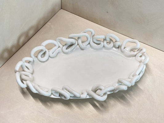 Centro tavola ovale bianco, dettaglio dell'intreccio