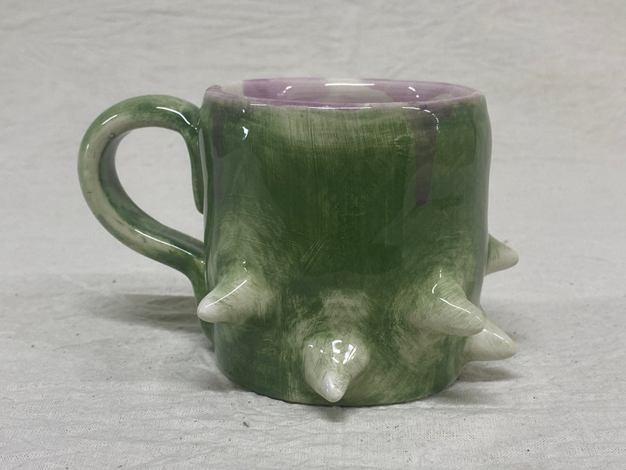 Mug with the poured glaze, close-up
