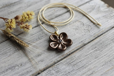 Ciondolo ceramica Fiore bronzo