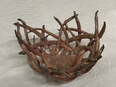 Tall red clay centrepiece with modelled branches