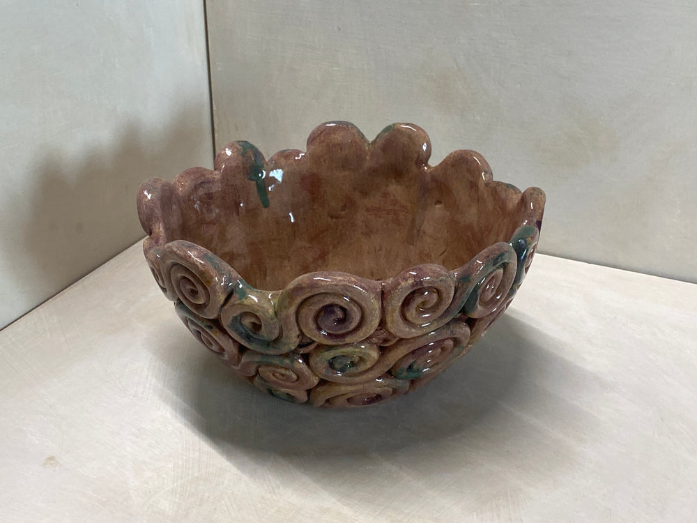 Bolo miele e ossidi in ceramica