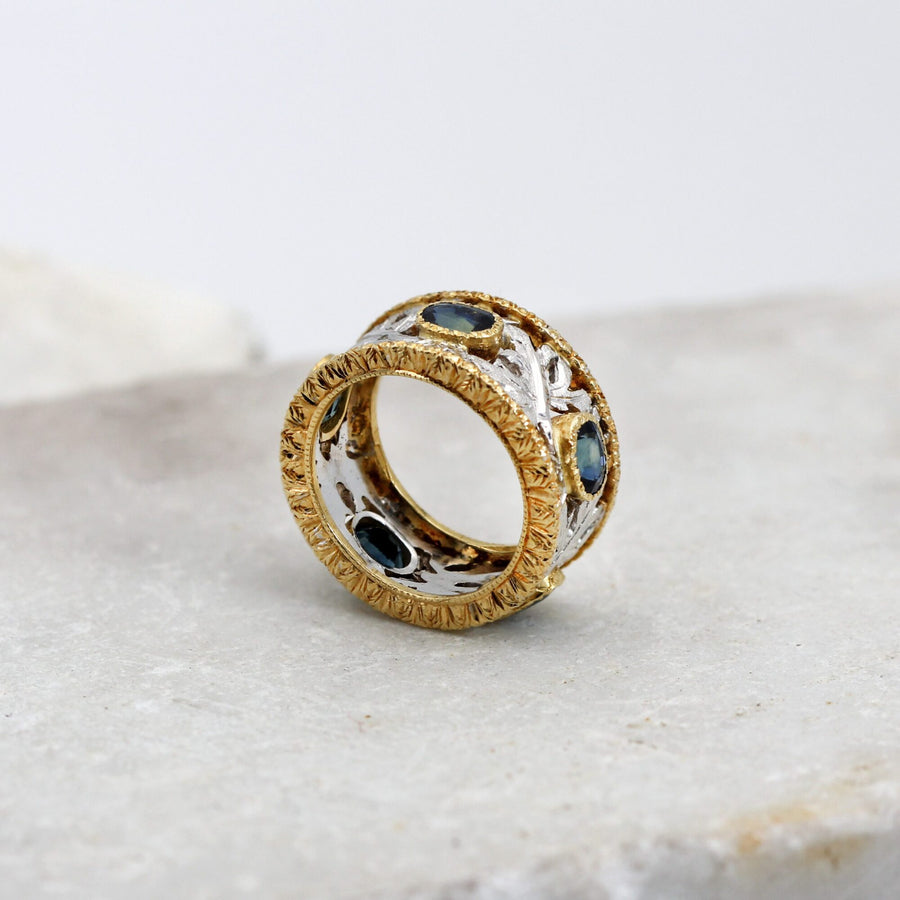 Wedding band with sapphires, the openwork against the light
