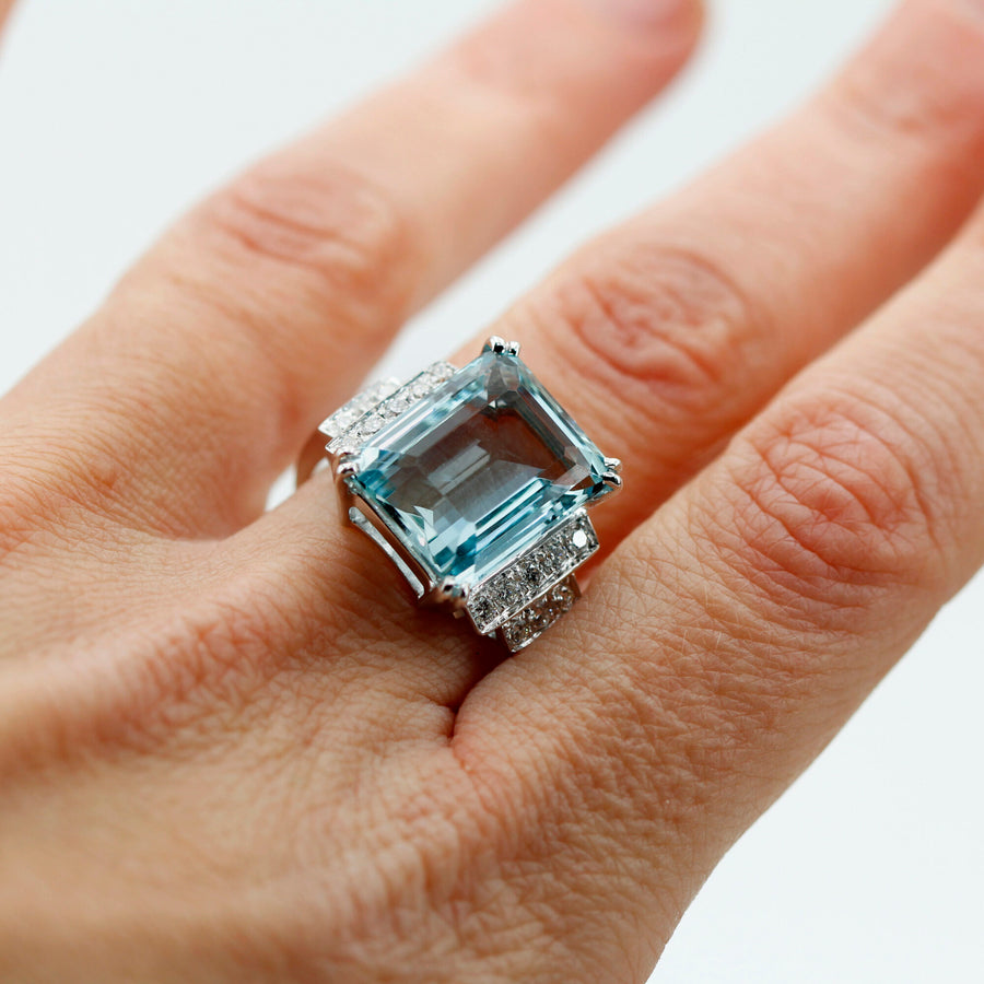 On the finger, from above: the size of the stone on the hand