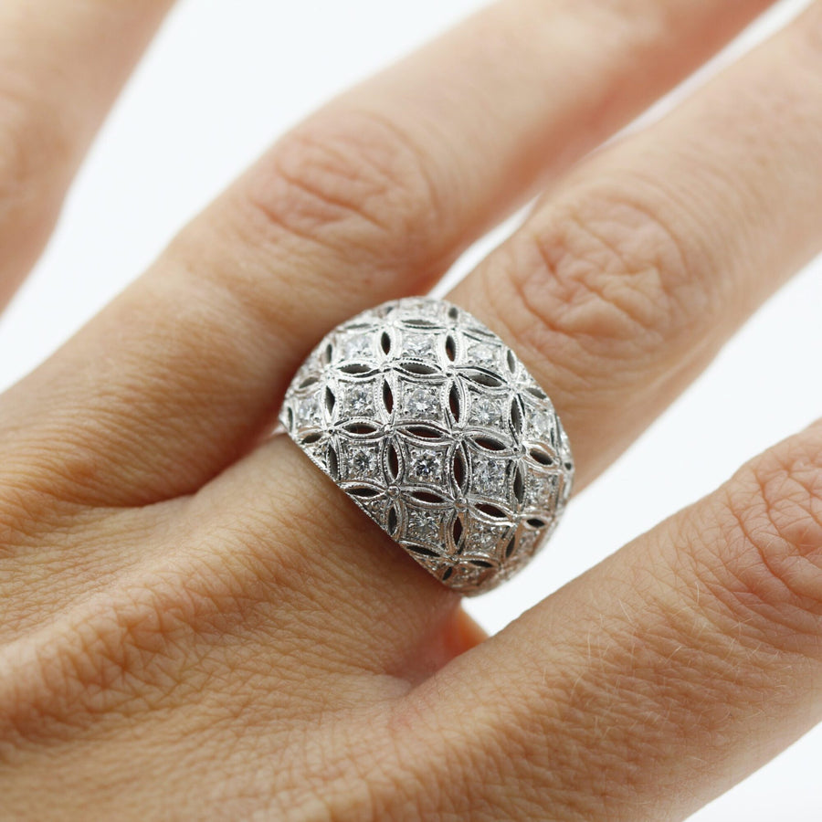 Domed white gold ring, close-up of the diamonds