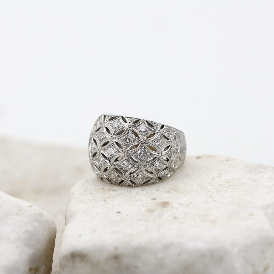 Domed white gold ring, side view