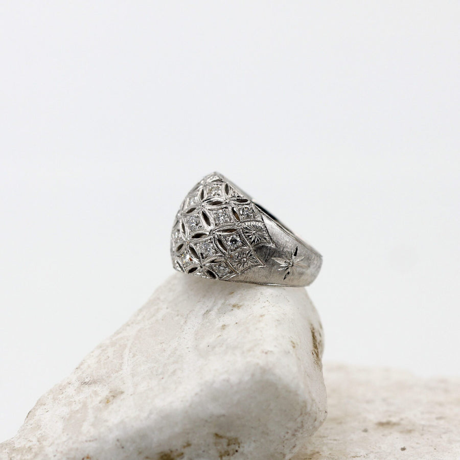 Domed white gold ring, the brilliants in the mesh