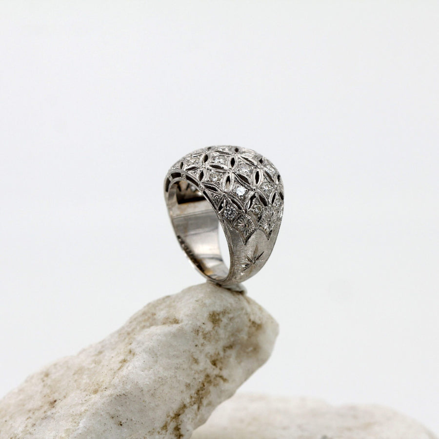 Domed white gold ring, the profile of the dome