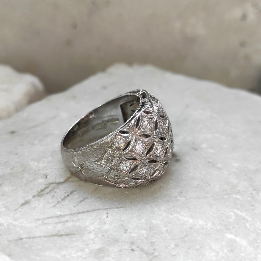 Domed white gold ring, the mesh work from above