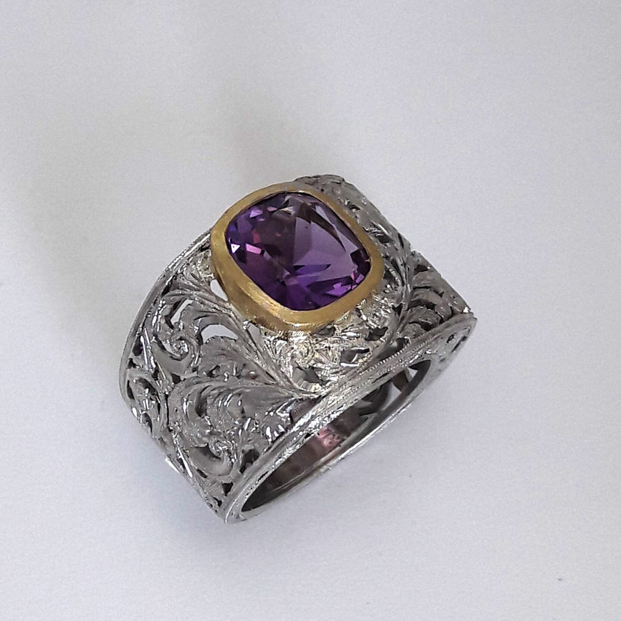 Studio shot on a light background: the bezel set askew, its sides not following the edges of the band