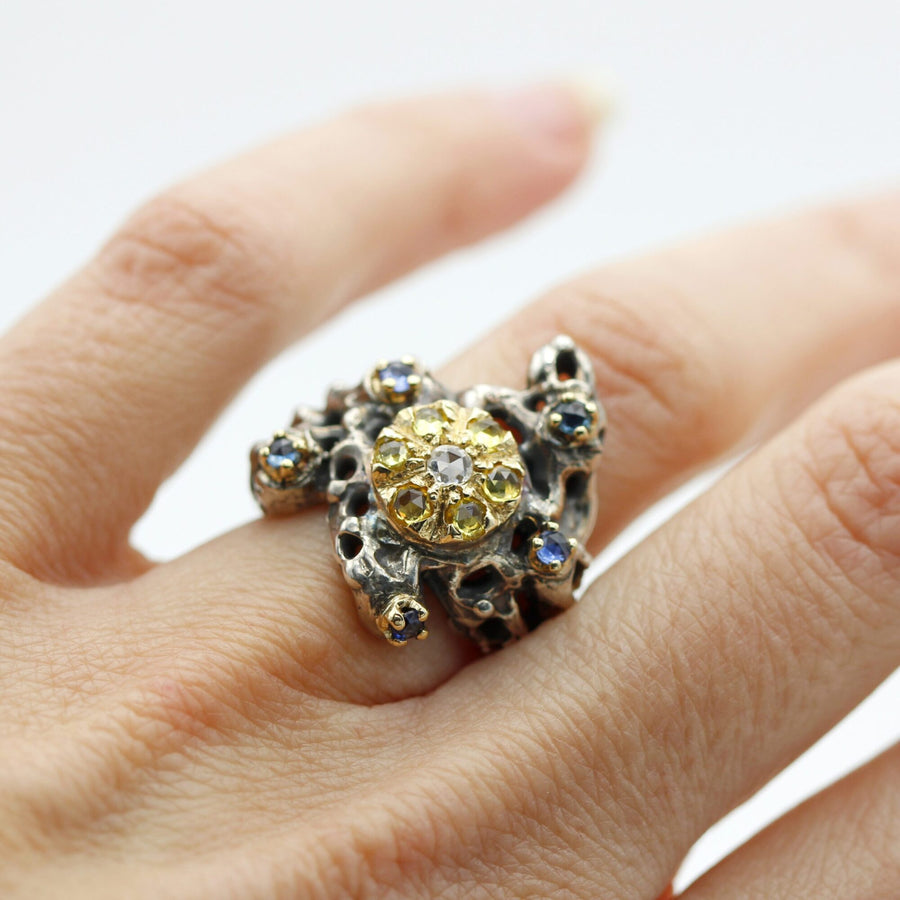 The ring worn, to show how much room it takes on the hand