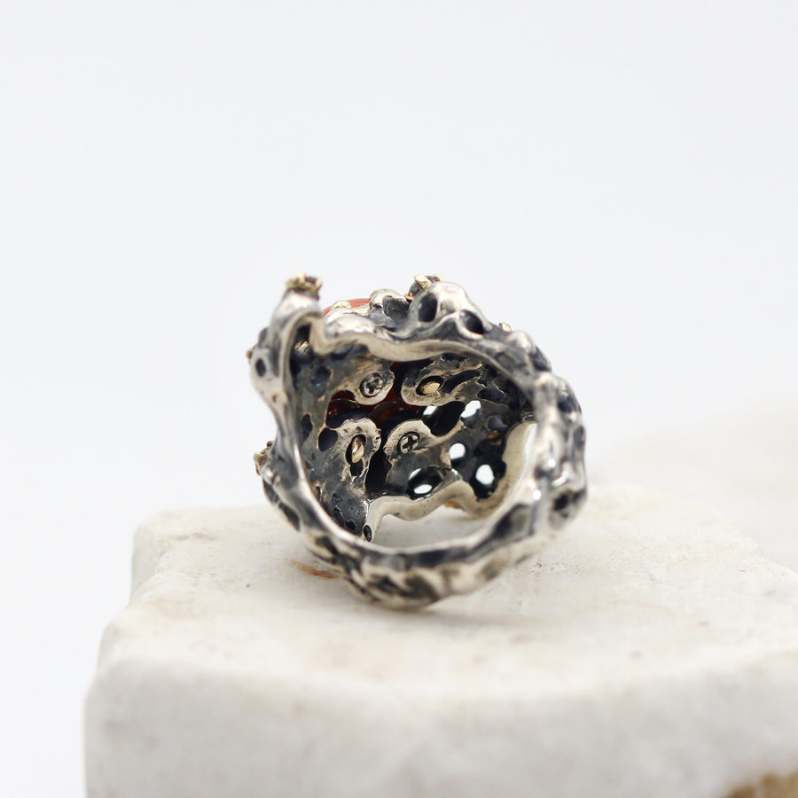 The ring from behind: the openwork seen from the reverse, with the openings passing right through