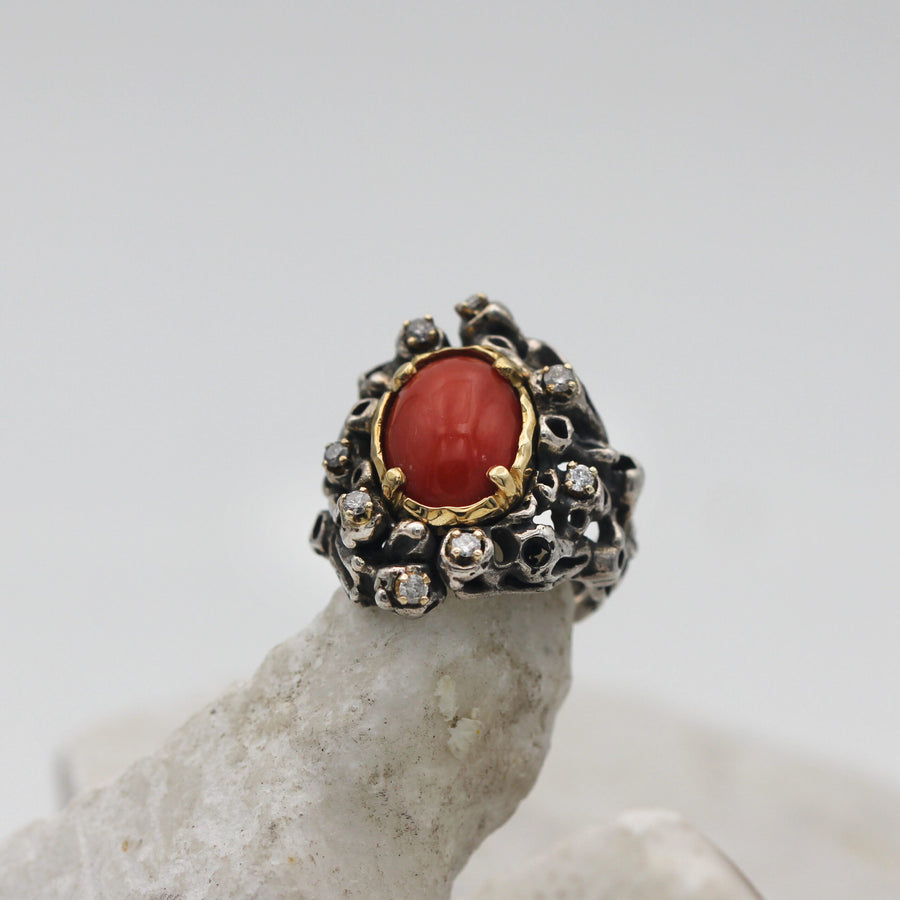 The whole piece from the front, coral and silver in the same frame