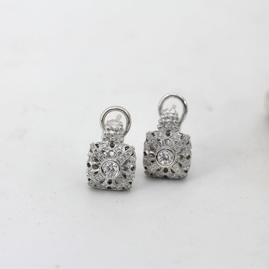 The pair from the front on a white background, the two openwork faces compared