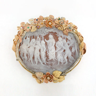 «Primavera» cameo carved by hand, in the frame of flowers in three golds with natural stones