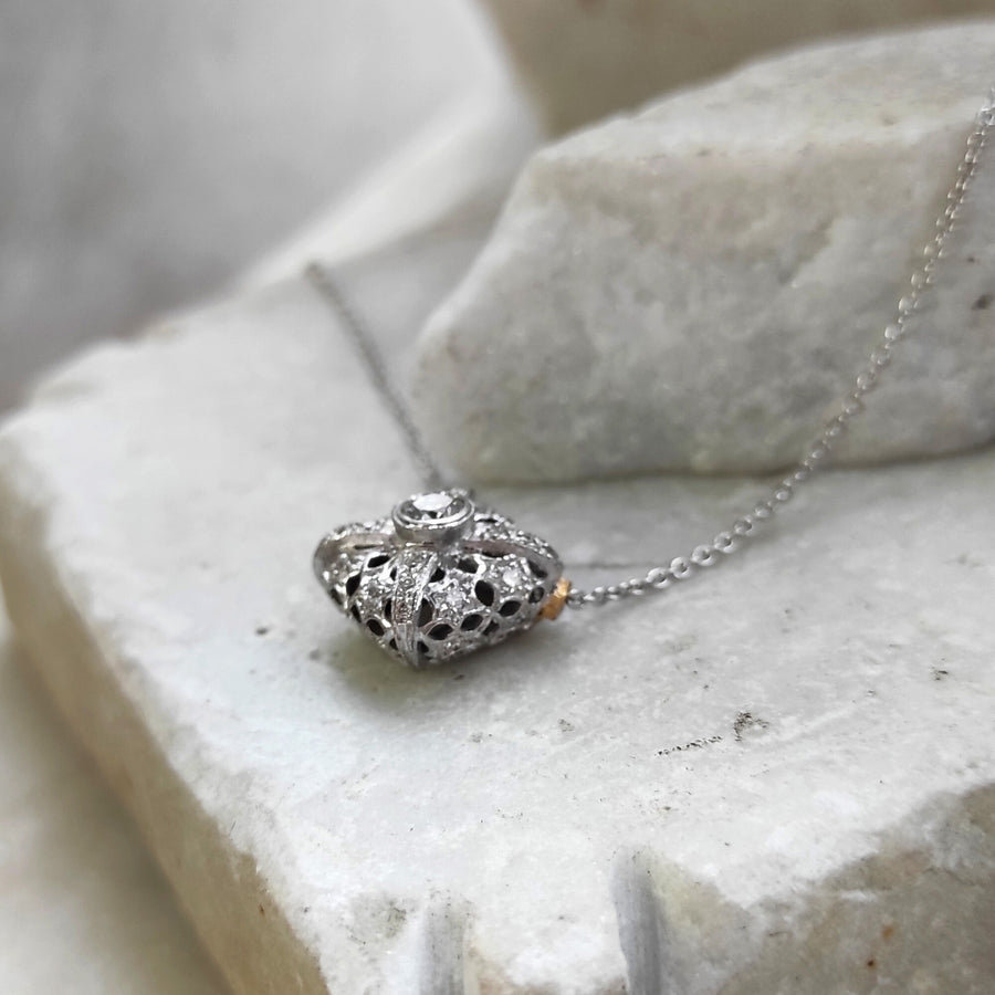 Lying flat: the domed profile of the cushion and the pierced sides