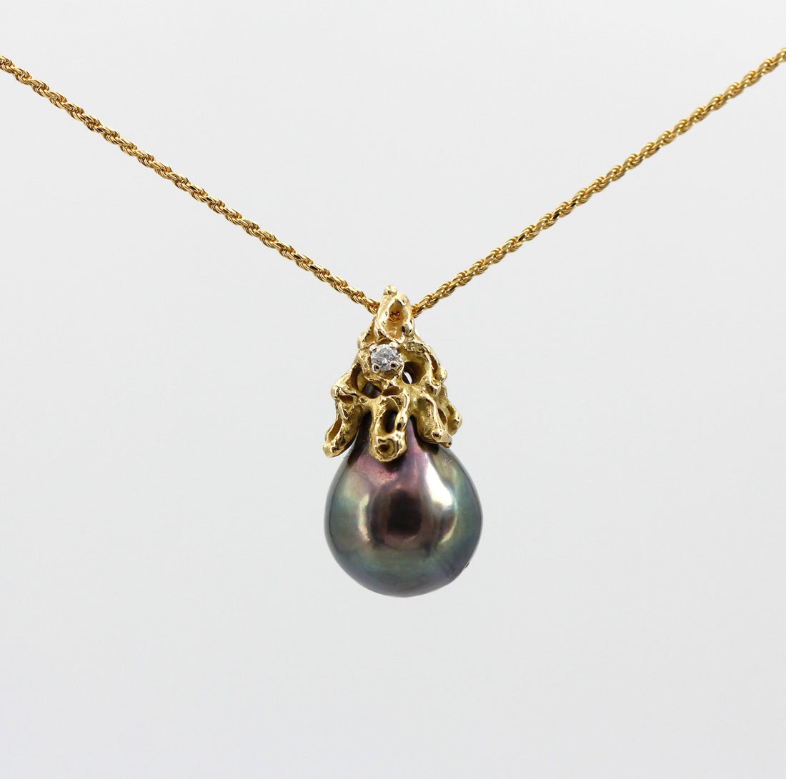 The pendant hanging from the chain on a light background, overall view (the chain is not included)
