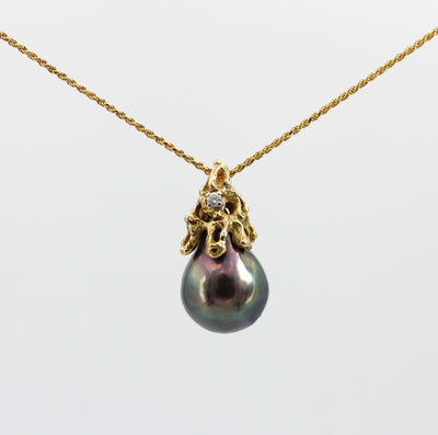The pendant hanging from the chain on a light background, overall view (the chain is not included)