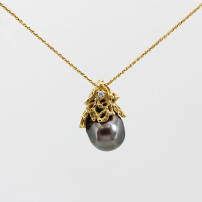 The pendant hanging from the chain on a white background, overall view (the chain is not included)