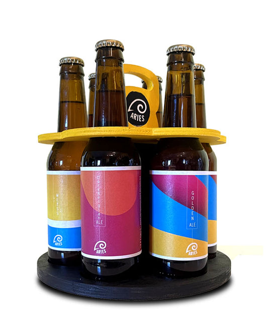 Il BeerRoulette giallo e nero con le sei bottiglie in cerchio