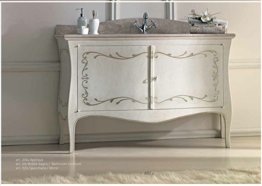 The 515 bathroom unit from the front: the bowed front, the silver festoon on the doors and the marble top with the two basins