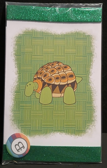 Il quadretto con la Tartaruga e la spilletta Bookendipity, nella confezione