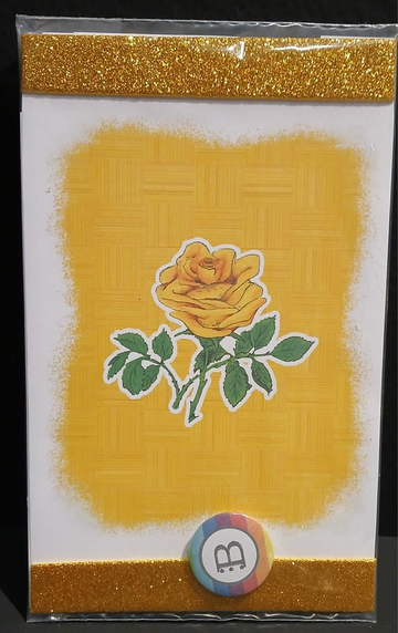 Il quadretto con la Rosa e la spilletta Bookendipity, nella confezione