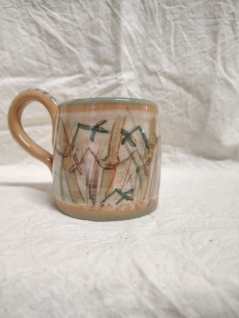 Tazza con le canne di bambù e il manico color terracotta
