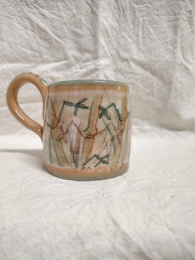 Tazza con le canne di bambù e il manico color terracotta