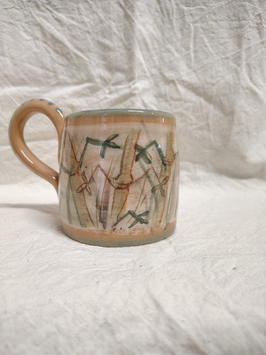 Tazza con le canne di bambù e il manico color terracotta